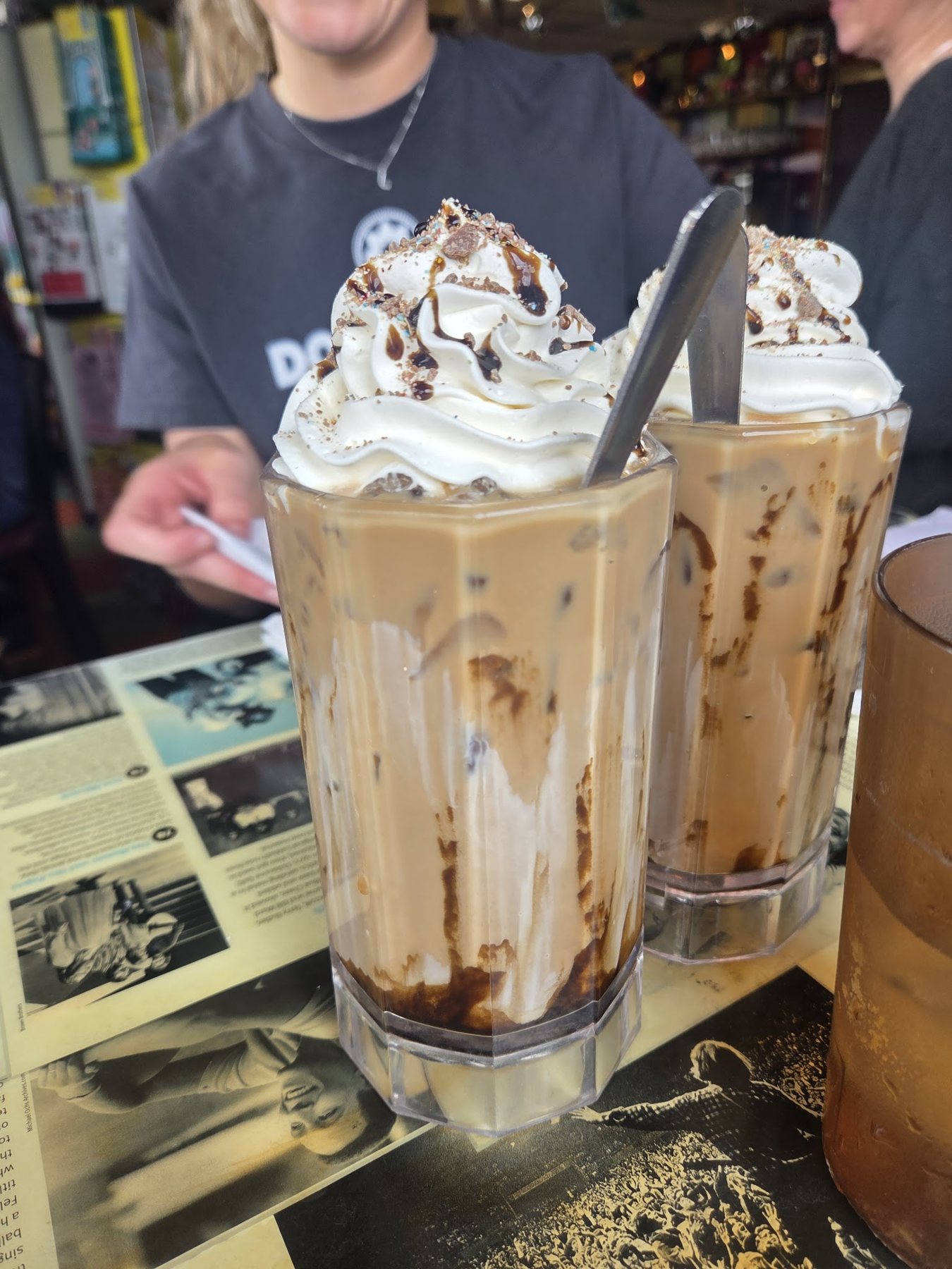Iced coffee drinks topped with whipped cream